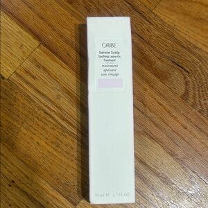 Oribe Serene Scalp Treatment in White Packaging